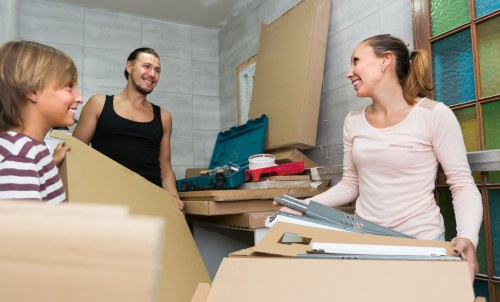 Packed boxes and furniture prepared for short-term storage